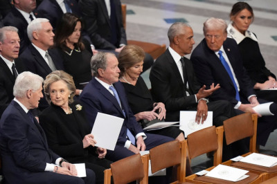 Michelle Obama, Dick Cheney among notable absences at Carter funeral