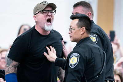 North Carolina GOP town hall turns heated as self-described veteran escorted out by security
