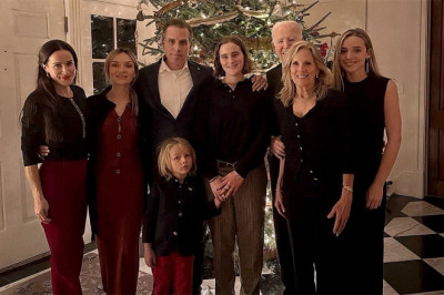 Biden nearly invisible in own Christmas family photo as Hunter takes center stage position