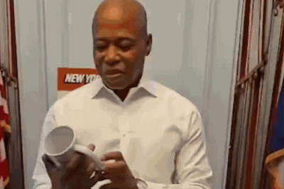 Adams reads his 'greatest hits' quotes from coffee mug in farewell tribute as NYC mayor