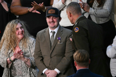 Trump awards Purple Hearts to National Guard members ambushed in Washington, DC: 'We love you all'